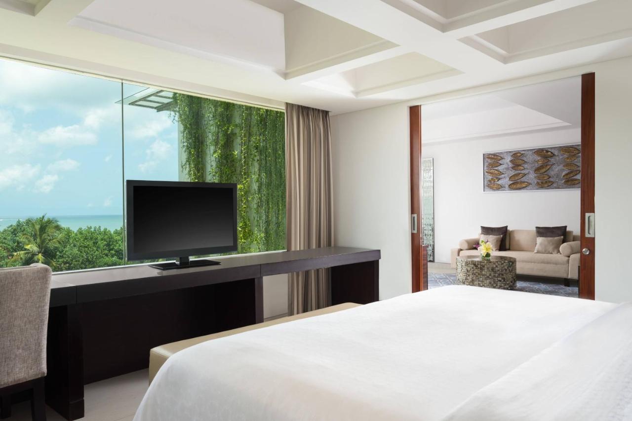 Sheraton Bali Kuta Resort Kuta Lombok Exterior foto A bedroom at the hotel