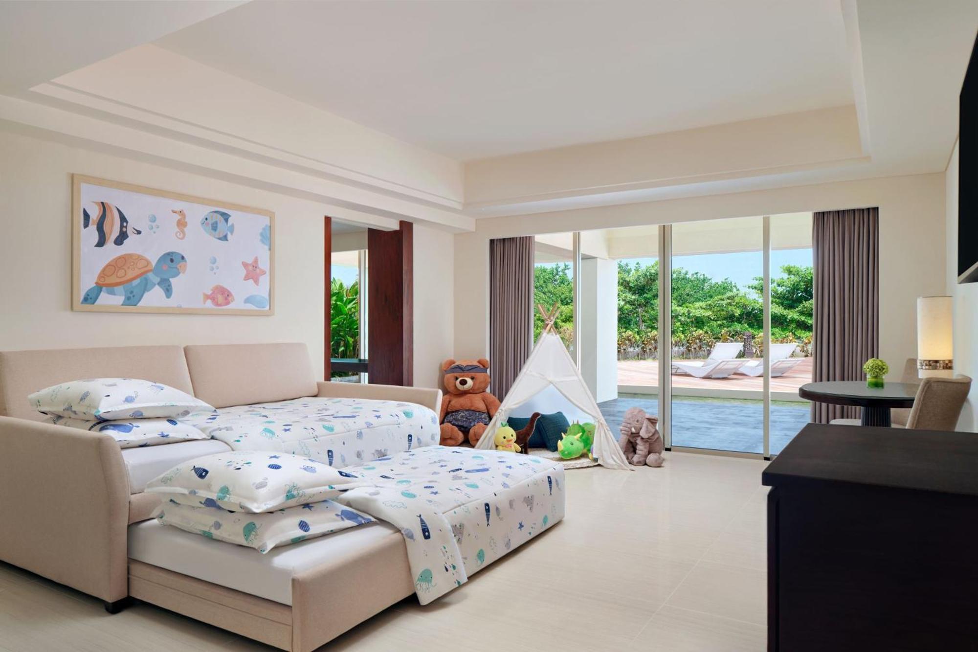Sheraton Bali Kuta Resort Kuta Lombok Exterior foto A bedroom at the Atlantis Paradise Island